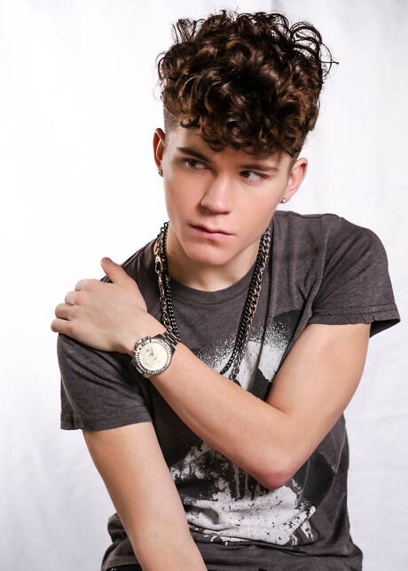 American twink Silas Brooks posing nude outside