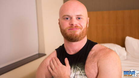 Hairy bear Chris Wydeman playing with cock