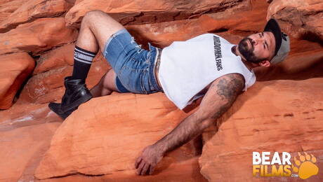 American mature bear Atlas Grant take off his clothes outside