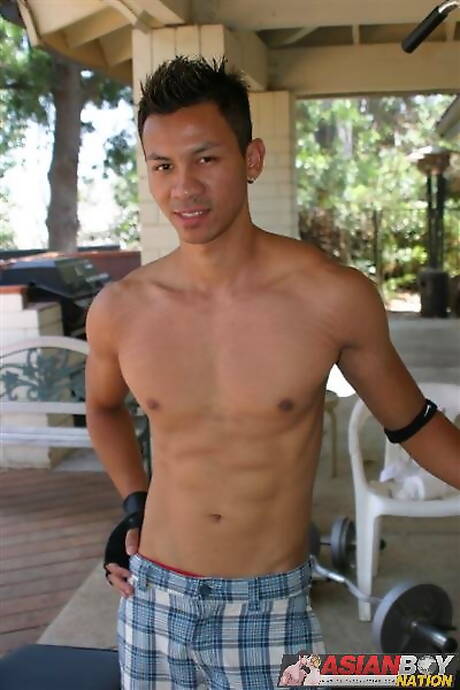 Asian beefcake Robbie Trinh playing with dick outdoor