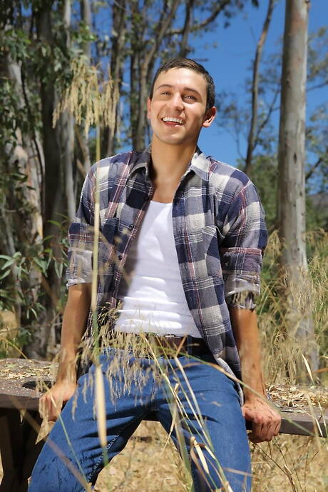 American beefcake Josh Conners teasing his dick outdoor